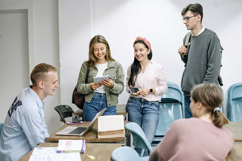 Image of a group of young people studying together